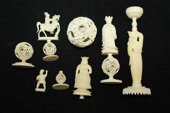 A Chinese export ivory puzzle ball and stand and four similar ivory chess pieces, 19th / early 20th century, 6.5cm - 21cm